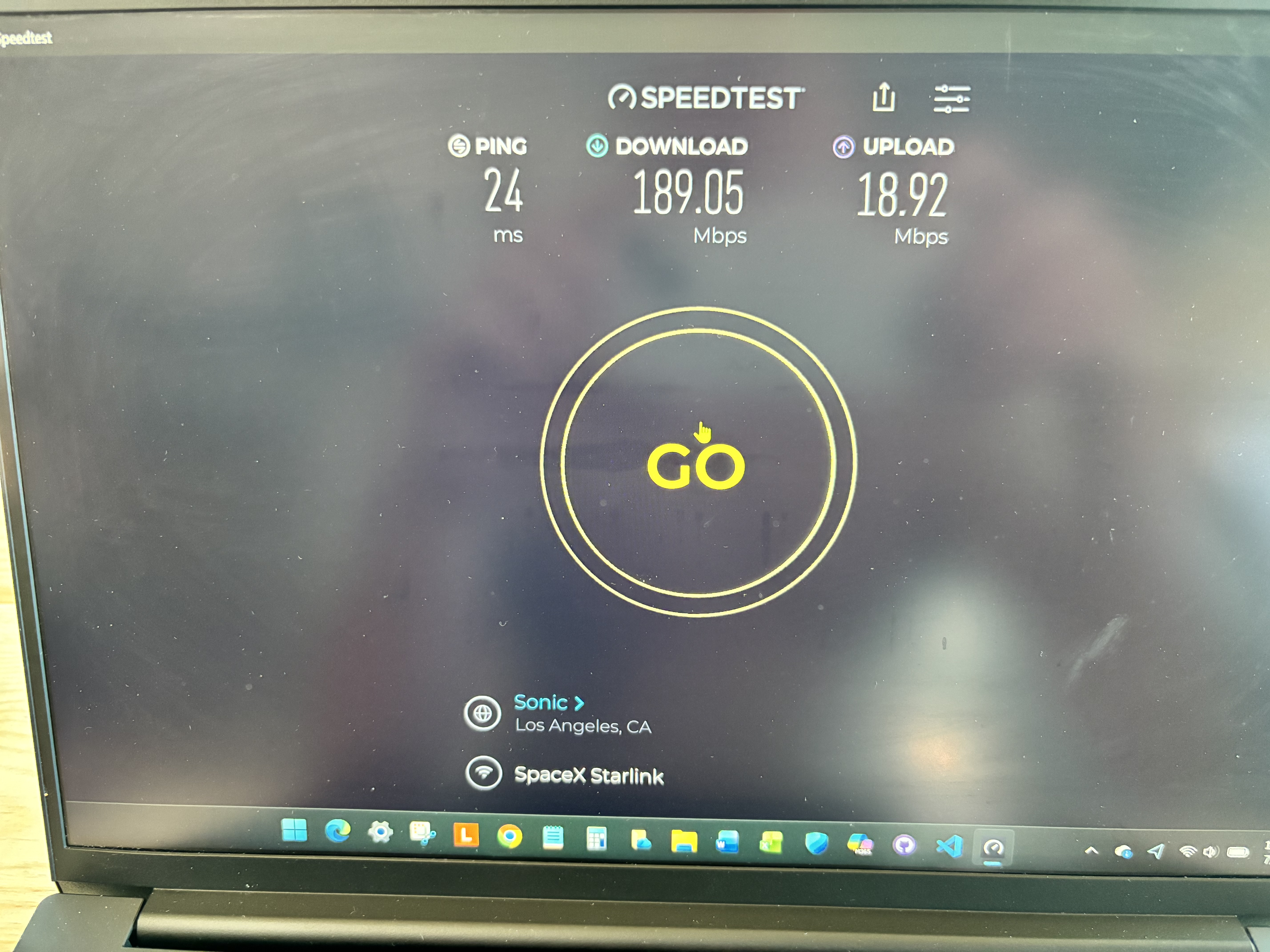 Ookla Speedtest on laptop showing 189.05 Mbps download, 18.92 Mbps upload, and 24 ms ping.